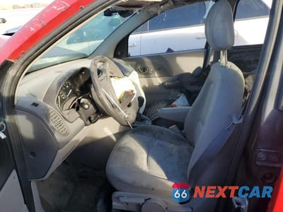 Zdjęcie 7 z 12 samochodu: 2003 SATURN VUE VIN:5GZCZ23D63S828994 - miniatura