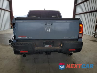 Zdjęcie 6 z 13 samochodu: 2022 HONDA RIDGELINE RTL VIN:5FPYK3F73NB503279 - miniatura