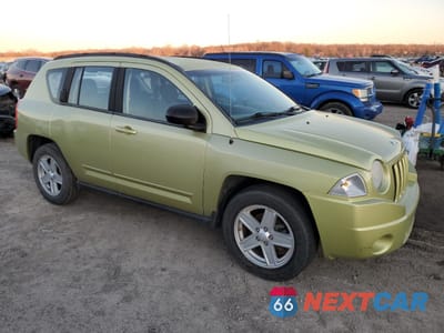 Czwarte zdjęcie samochodu z boku: 2010 JEEP COMPASS SPORT VIN:1J4NT4FB3AD518945 - miniatura