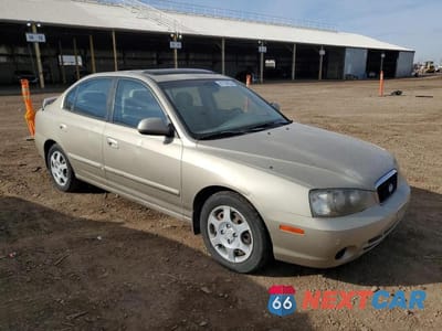 Czwarte zdjęcie samochodu z boku: 2003 HYUNDAI ELANTRA GLS VIN:KMHDN45D63U598383 - miniatura
