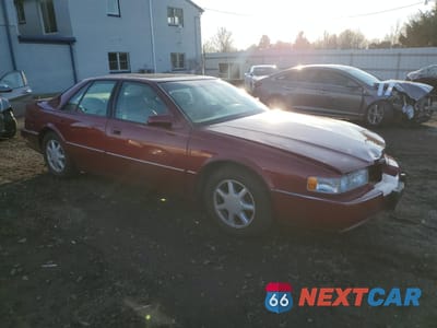 Czwarte zdjęcie samochodu z boku: 1996 CADILLAC SEVILLE STS VIN:1G6KY5291TU836538 - miniatura