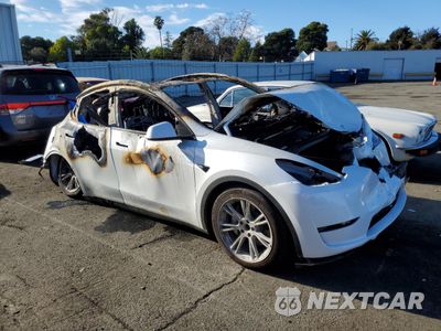 Czwarte zdjęcie samochodu z boku: 2023 TESLA MODEL Y VIN:7SAYGAEE4PF740805 - miniatura