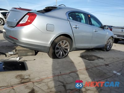 Trzecie zdjęcie samochodu z tyłu: 2013 LINCOLN MKS VIN:1LNHL9DKXDG605095 - miniatura