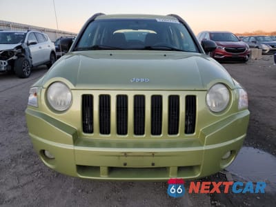Piąte zdjęcie samochodu w środku: 2010 JEEP COMPASS SPORT VIN:1J4NT4FB3AD518945 - miniatura