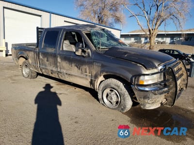 Czwarte zdjęcie samochodu z boku: 2002 FORD F250 SUPER DUTY VIN:1FTNW21FX2ED46131 - miniatura