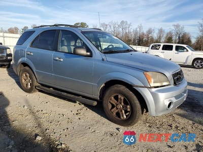 Czwarte zdjęcie samochodu z boku: 2006 KIA SORENTO EX VIN:KNDJD733065606532 - miniatura