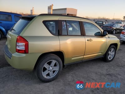 Trzecie zdjęcie samochodu z tyłu: 2010 JEEP COMPASS SPORT VIN:1J4NT4FB3AD518945 - miniatura