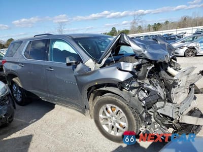 Czwarte zdjęcie samochodu z boku: 2018 CHEVROLET TRAVERSE LT VIN:1GNERGKWXJJ252217 - miniatura