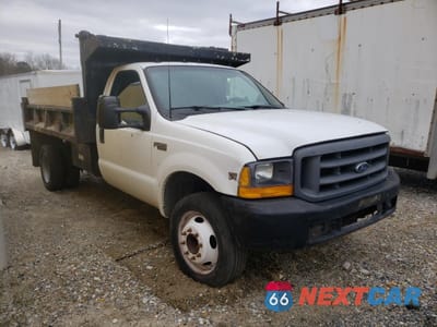 Czwarte zdjęcie samochodu z boku: 1999 FORD F450 SUPER DUTY VIN:1FDXF46F8XEB32982 - miniatura