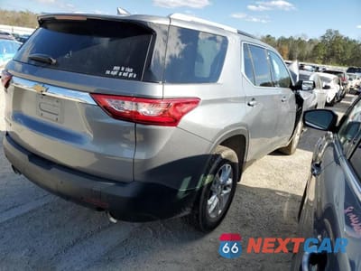 Trzecie zdjęcie samochodu z tyłu: 2018 CHEVROLET TRAVERSE LT VIN:1GNERGKWXJJ252217 - miniatura
