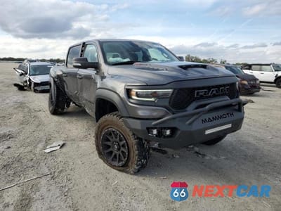 Czwarte zdjęcie samochodu z boku: 2022 RAM 1500 TRX VIN:1C6SRFU91NN370532 - miniatura