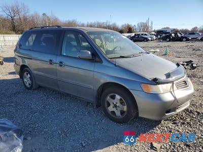 Czwarte zdjęcie samochodu z boku: 2000 HONDA ODYSSEY EX VIN:2HKRL1862YH589516 - miniatura