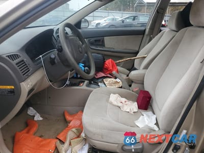 Zdjęcie 7 z 12 samochodu: 2004 KIA SPECTRA LX VIN:KNAFE121045029608 - miniatura