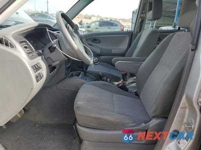 Zdjęcie 7 z 14 samochodu: 2004 CHEVROLET TRACKER VIN:2CNBJ134146918164 - miniatura