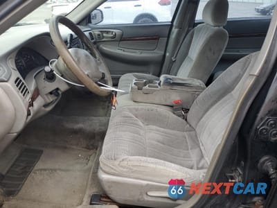 Zdjęcie 7 z 13 samochodu: 2001 CHEVROLET IMPALA VIN:2G1WF52E019229843 - miniatura
