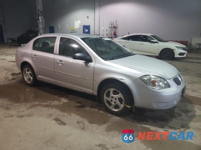 Czwarte zdjęcie samochodu z boku: 2007 PONTIAC G5 VIN:1G2AJ55F577343873 - miniatura