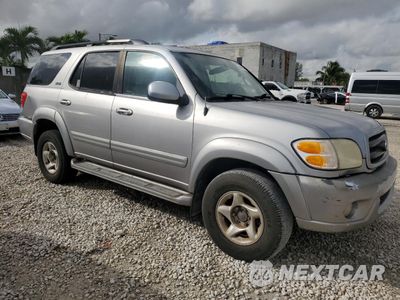 Czwarte zdjęcie samochodu z boku: 2001 TOYOTA SEQUOIA SR5 VIN:5TDBT44A41S033611 - miniatura