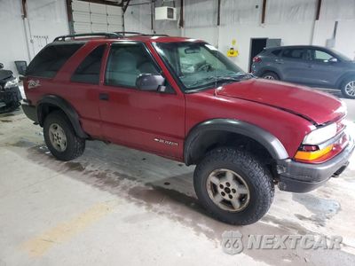 Czwarte zdjęcie samochodu z boku: 2000 CHEVROLET BLAZER VIN:1GNCT18W4YK199435 - miniatura