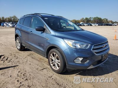 Czwarte zdjęcie samochodu z boku: 2018 FORD ESCAPE SE VIN:1FMCU9GD4JUC01551 - miniatura