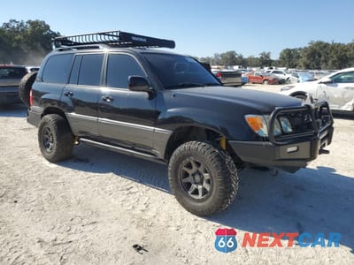 Czwarte zdjęcie samochodu z boku: 2004 LEXUS LX 470 VIN:JTJHT00WX43536762 - miniatura