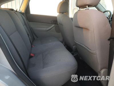 Zdjęcie 10 z 14 samochodu: 2006 FORD FOCUS ZX5 VIN:1FAHP37N46W205446 - miniatura