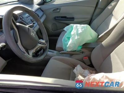 Zdjęcie 7 z 13 samochodu: 2010 HONDA INSIGHT EX VIN:JHMZE2H75AS036373 - miniatura