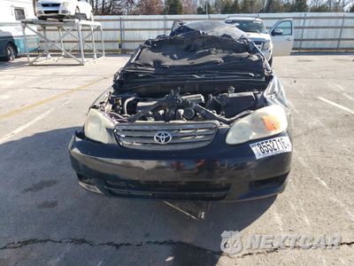 Piąte zdjęcie samochodu w środku: 2003 TOYOTA COROLLA CE VIN:1NXBR32E23Z144506 - miniatura