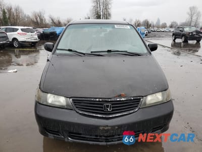 Piąte zdjęcie samochodu w środku: 2000 HONDA ODYSSEY LX VIN:2HKRL1853YH580900 - miniatura