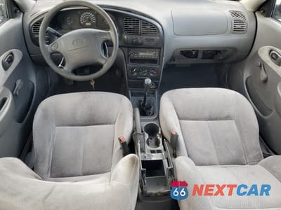 Zdjęcie 8 z 13 samochodu: 2003 KIA SPECTRA BASE VIN:KNAFB121835264507 - miniatura