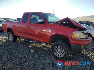 Czwarte zdjęcie samochodu z boku: 2001 FORD F150 VIN:1FTRX18L91NB78887 - miniatura