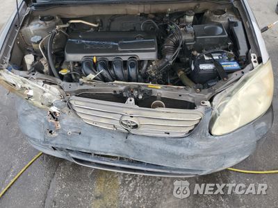 Zdjęcie 11 z 13 samochodu: 2003 TOYOTA COROLLA CE VIN:1NXBR32E23Z073646 - miniatura
