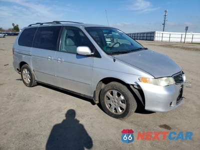 Czwarte zdjęcie samochodu z boku: 2002 HONDA ODYSSEY EXL VIN:5FNRL18042B056553 - miniatura