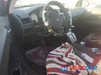 Zdjęcie 8 z 12 samochodu: 2009 DODGE CALIBER SXT VIN:1B3HB48AX9D125483 - miniatura