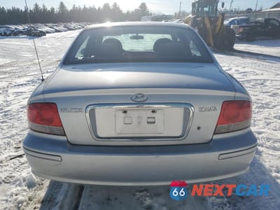 Zdjęcie 6 z 13 samochodu: 2003 HYUNDAI SONATA GL VIN:KMHWF25SX3A748134 - miniatura