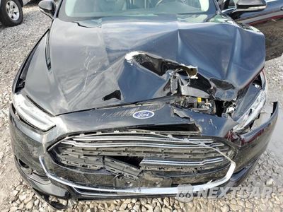 Zdjęcie 11 z 12 samochodu: 2016 FORD FUSION TITANIUM VIN:3FA6P0K96GR231776 - miniatura