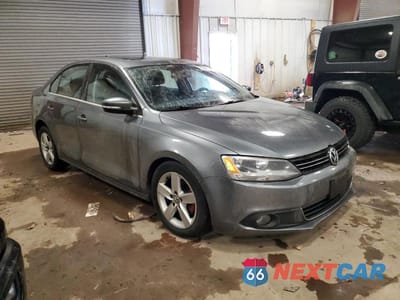 Czwarte zdjęcie samochodu z boku: 2012 VOLKSWAGEN JETTA TDI VIN:3VWLL7AJ7CM008003 - miniatura