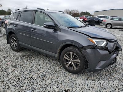 Czwarte zdjęcie samochodu z boku: 2017 TOYOTA RAV4 XLE VIN:JTMRFREVXHD209152 - miniatura