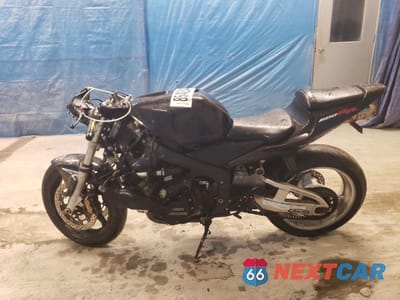 Trzecie zdjęcie samochodu z tyłu: 2003 HONDA CBR600 RR VIN:JH2PC37013M010179 - miniatura