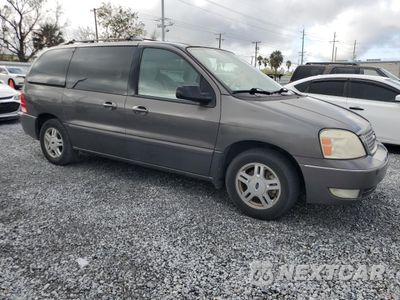 Czwarte zdjęcie samochodu z boku: 2005 FORD FREESTAR SEL VIN:2FMZA52205BA76674 - miniatura