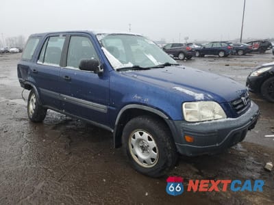Czwarte zdjęcie samochodu z boku: 1999 HONDA CR-V LX VIN:JHLRD1848XC080829 - miniatura