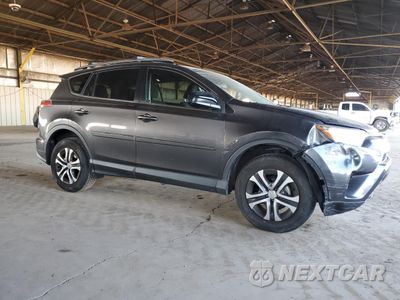 Czwarte zdjęcie samochodu z boku: 2017 TOYOTA RAV4 LE VIN:JTMBFREV4HJ139585 - miniatura