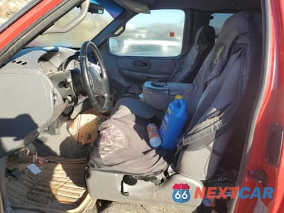 Zdjęcie 7 z 12 samochodu: 2001 FORD F150 VIN:1FTRX18L91NB78887 - miniatura