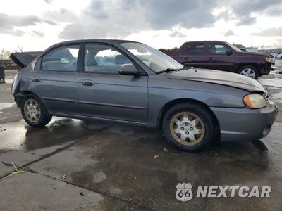Czwarte zdjęcie samochodu z boku: 2003 KIA SPECTRA BASE VIN:KNAFB121835264507 - miniatura