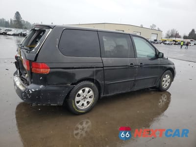 Trzecie zdjęcie samochodu z tyłu: 2000 HONDA ODYSSEY LX VIN:2HKRL1853YH580900 - miniatura