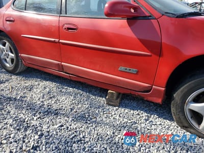 Zdjęcie 9 z 10 samochodu: 1999 PONTIAC GRAND PRIX GTP VIN:1G2WR5218XF341886 - miniatura