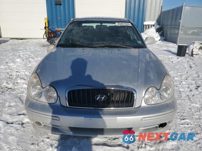 Piąte zdjęcie samochodu w środku: 2003 HYUNDAI SONATA GL VIN:KMHWF25SX3A748134 - miniatura