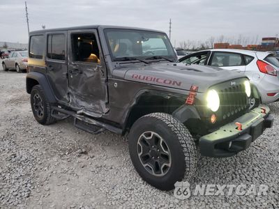 Czwarte zdjęcie samochodu z boku: 2014 JEEP WRANGLER UNLIMITED RUBICON VIN:1C4BJWFG2EL268275 - miniatura