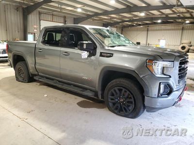 Czwarte zdjęcie samochodu z boku: 2019 GMC SIERRA K1500 AT4 VIN:1GTP9EEL1KZ221187 - miniatura