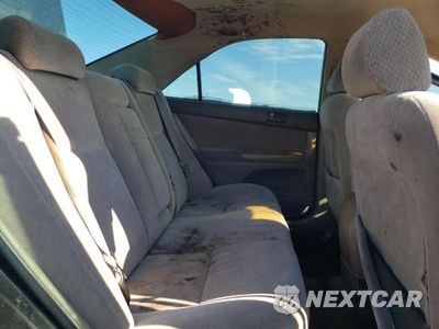Zdjęcie 10 z 12 samochodu: 2003 TOYOTA CAMRY LE VIN:4T1BE32K83U657566 - miniatura