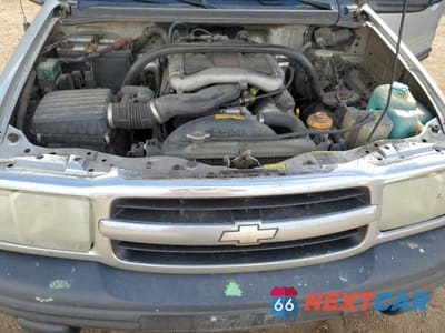 Zdjęcie 12 z 14 samochodu: 2004 CHEVROLET TRACKER VIN:2CNBJ134146918164 - miniatura